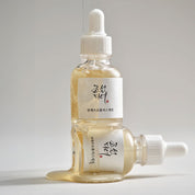 Sérum éclat Beauty of Joseon Glow, Propolis + Niacinamide, 30 ml, flacon en verre avec étiquette dorée, produit coréen viral TikTok, skincare coréenne | Beauty of Joseon Glow Serum, Propolis + Niacinamide, 30 ml, glass bottle with gold label, viral Korean product on TikTok, Korean skincare